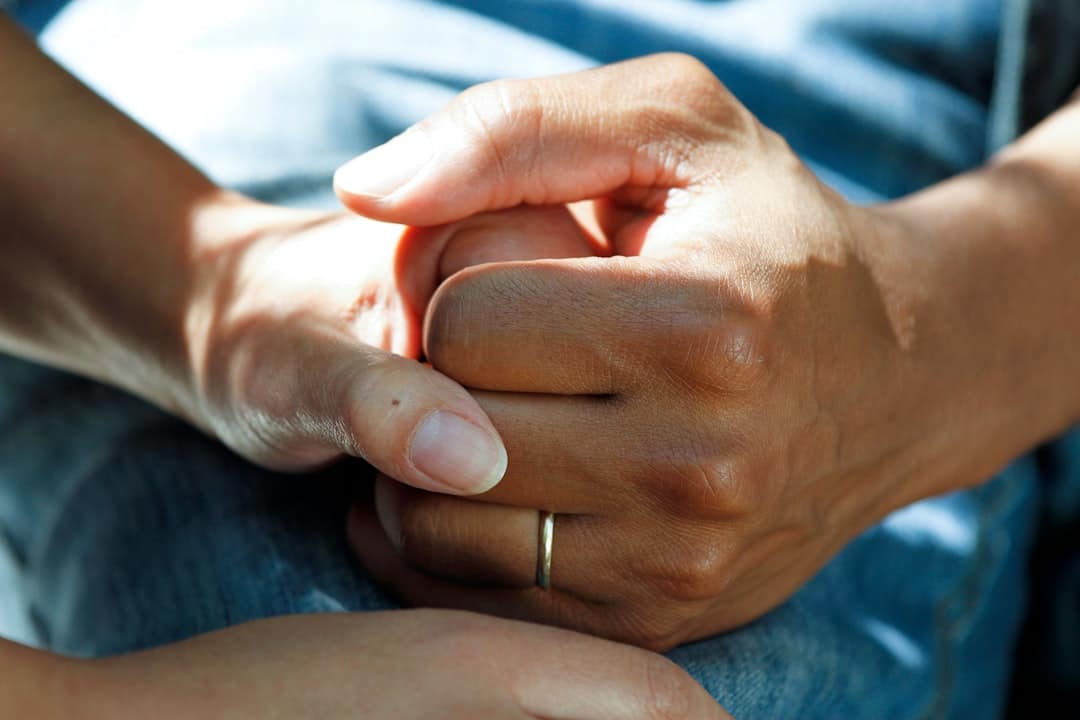 Lifetime Support person wearing gold wedding band